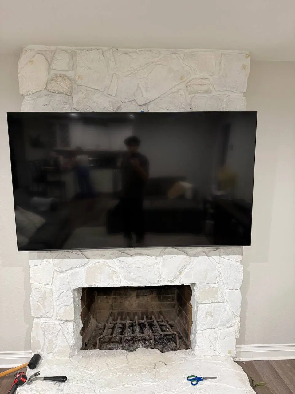 Completed television installation above a fireplace 1