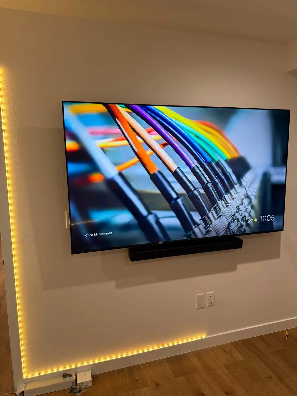 Wall-mounted television installation with cable concealment 2