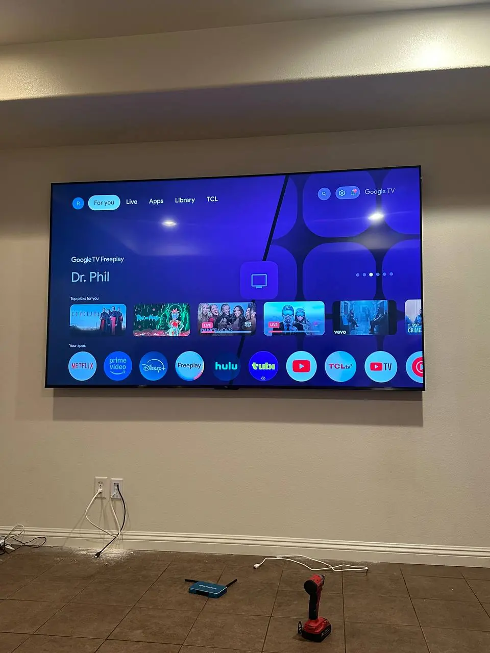 Wall-mounted television installation with cable concealment 3